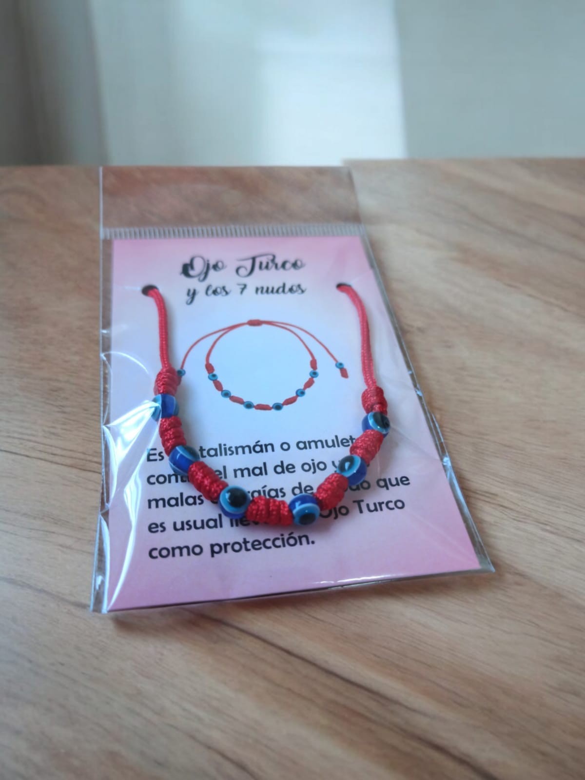 **Pulsera 7 nudos roja con ojos turcos